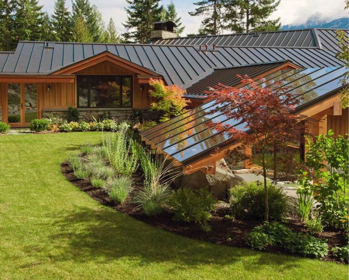 Stonebridge show home metal roof landscaping